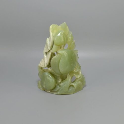 carved persimmon jade sculpture
